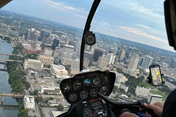 Downtown Nashville seen through a helicopter windshield